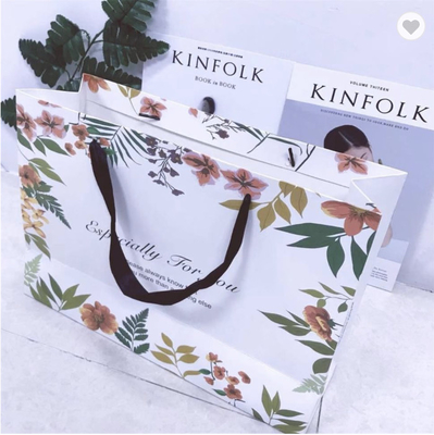 Goede prijs. Matt gelamineerde papieren zak verpakking kunstpapier luxe geschenkzakken met bloem online